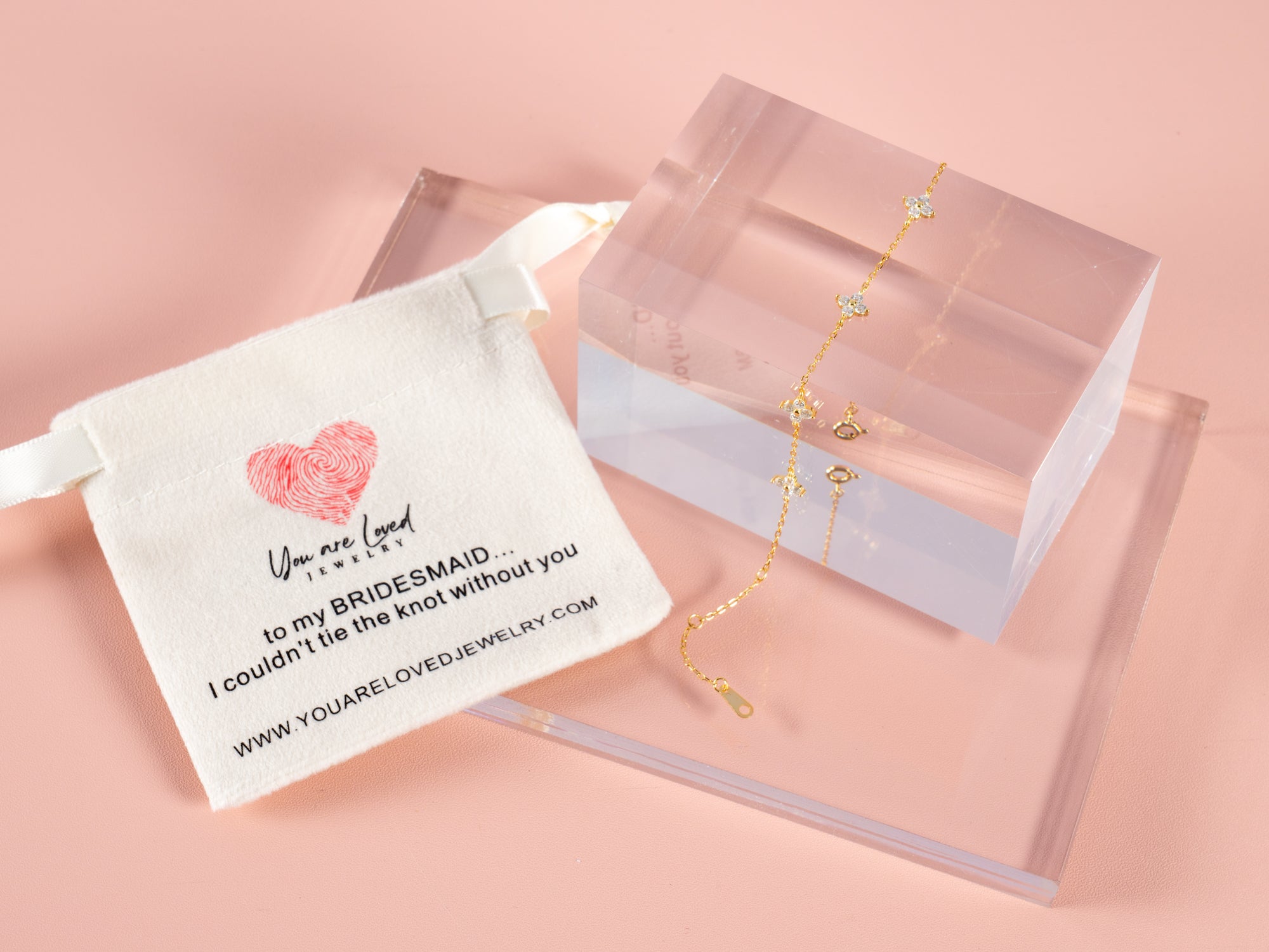 crystal clover bracelet that can be gifted to bridesmaids and comes with a can't tie the knot without you gift pouch