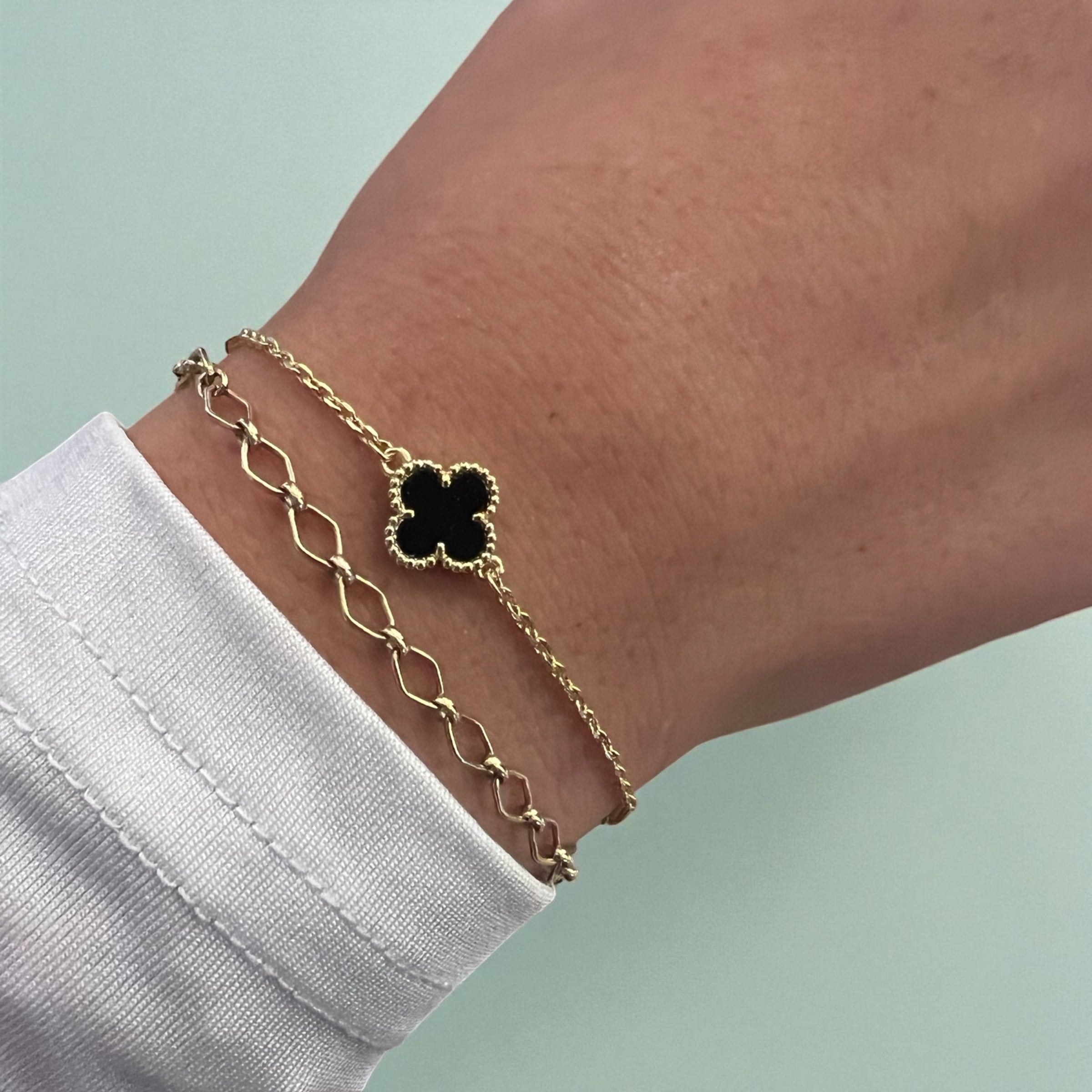 black single clover bracelet similar to sweet alhambra by van cleef