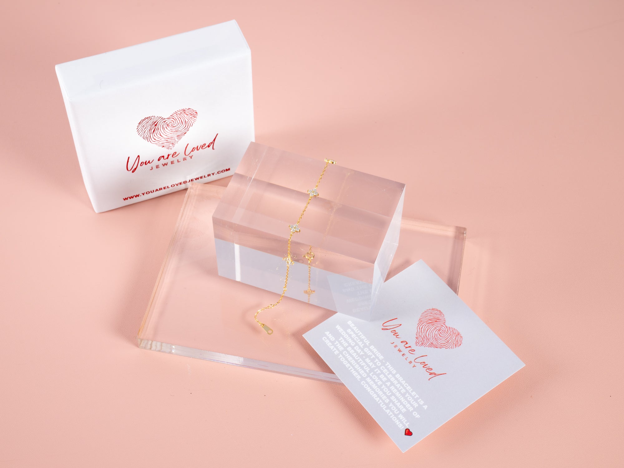 our crystal clover glower gemstone bracelet is adjustable and shown here with a congrats card for the bride making it a great gift for brides for showers or the wedding